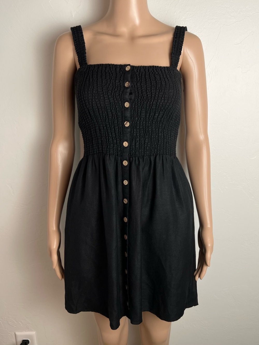 chaser brand smocked button front tank dress in black with side pockets